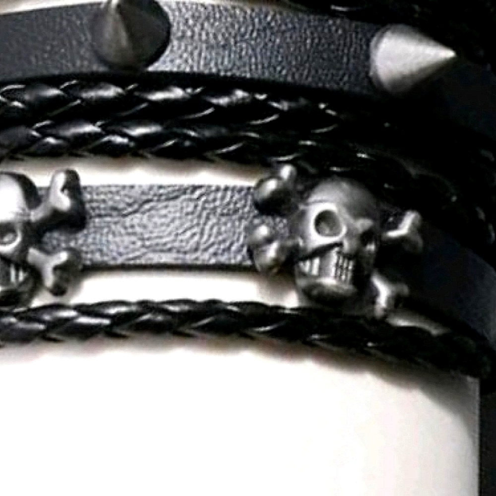 2 Pcs Skull And Studded Bracelet .